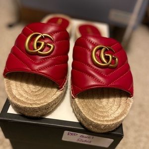 Women’s leather red Gucci slides